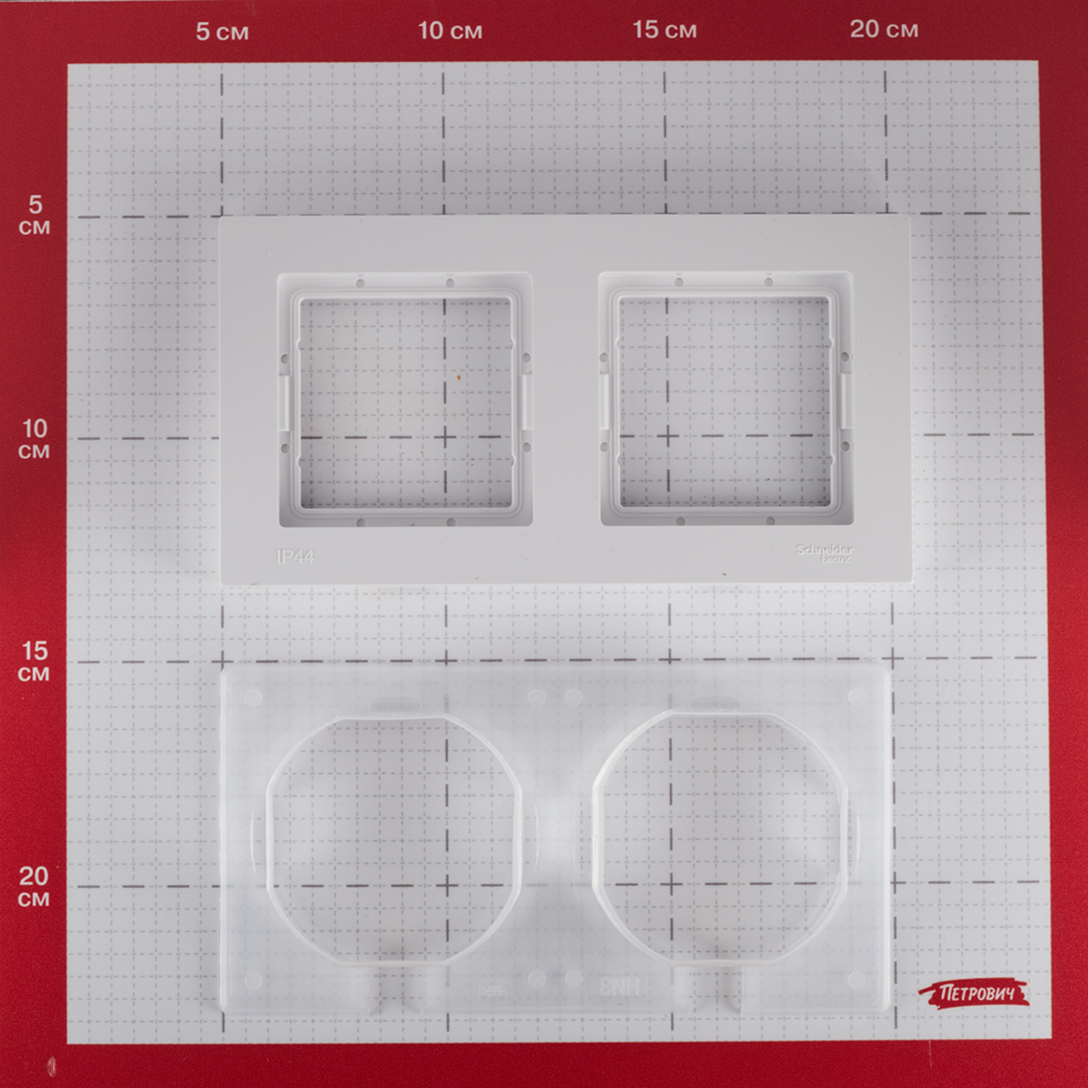 фото Рамка schneider electric atlas design atn440102 двухместная универсальная белая для розеток и переключателей ip44